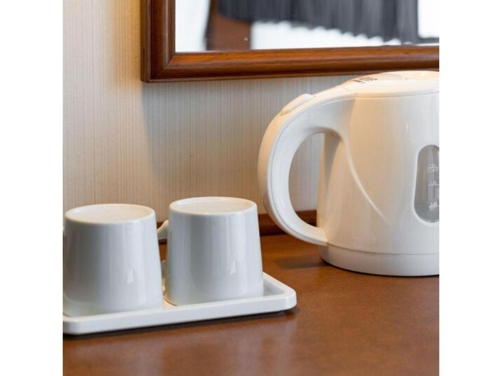 Plaza Hotel Tenjin Фукуока Экстерьер фото