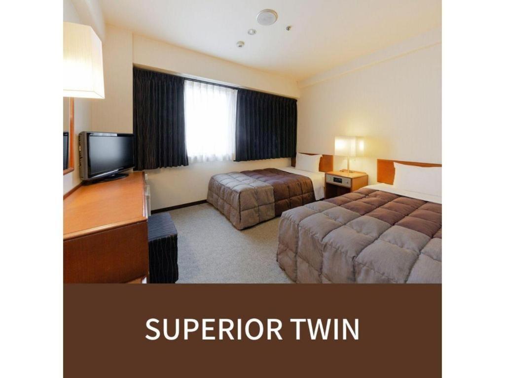 Plaza Hotel Tenjin Фукуока Экстерьер фото