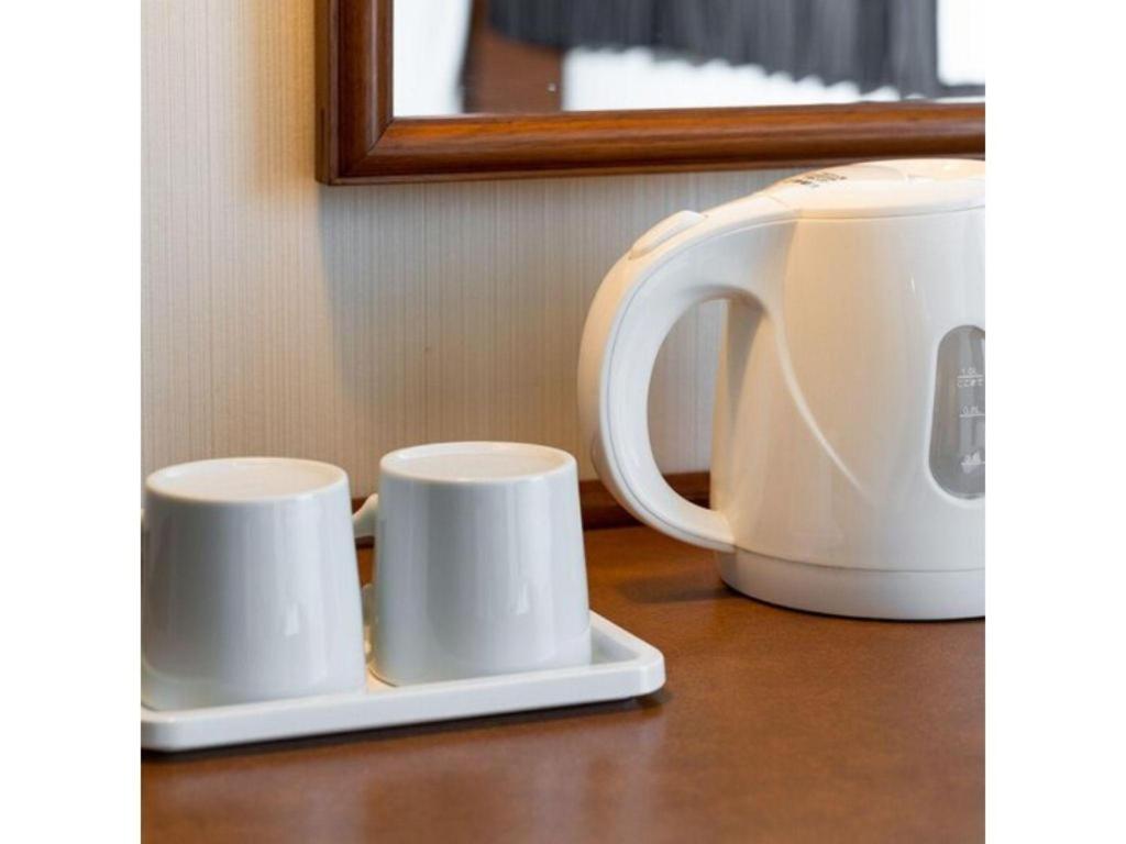 Plaza Hotel Tenjin Фукуока Экстерьер фото